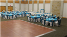 Turquoise and white wedding reception with table settings of turquoise table cloths with a dance flo
